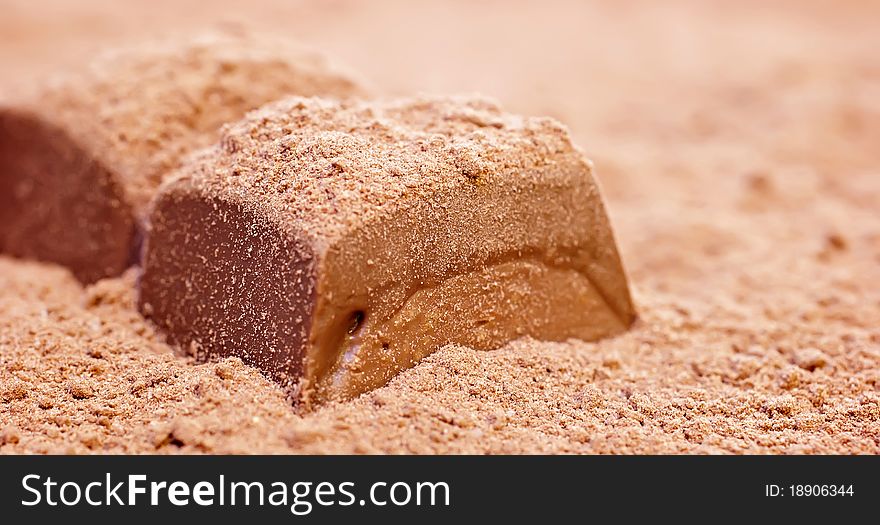 Piece of chocolate cocoa powder. Piece of chocolate cocoa powder.