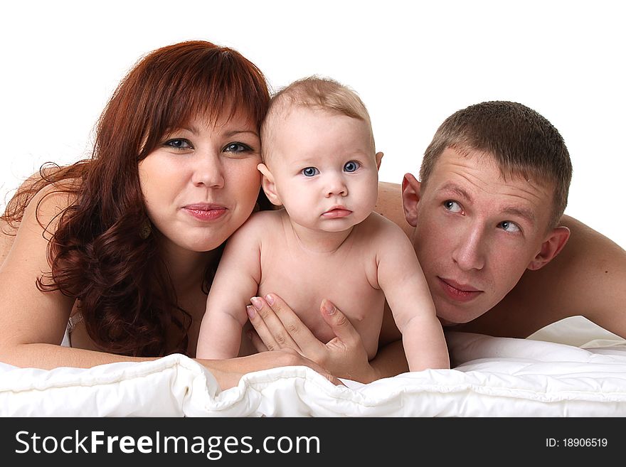 Young smiling family on white background