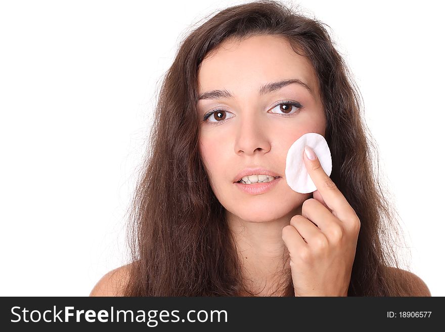 Beautiful Girl With Cotton Pads On White