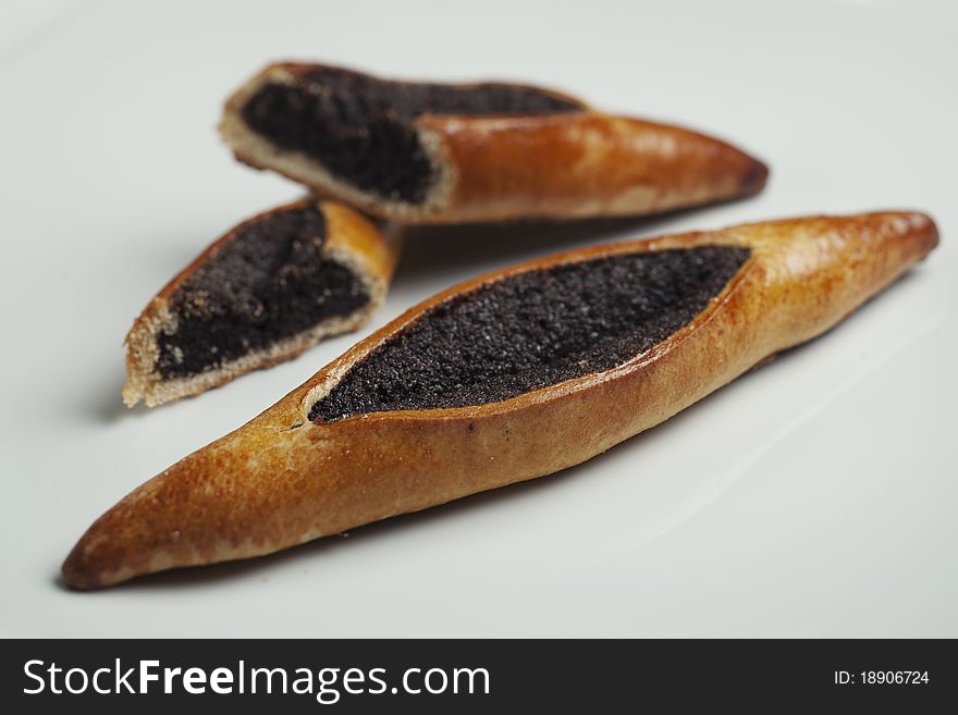 Freshly baked home made pastry filled with poppy seeds. Freshly baked home made pastry filled with poppy seeds