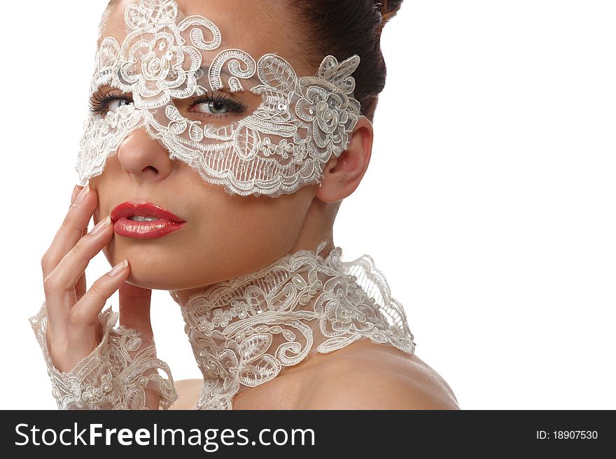 Portrait of attractive woman wearing delicate white lace on her eyes and lace necklace, lace glove, sitting of elegant position in studio, on white background. Portrait of attractive woman wearing delicate white lace on her eyes and lace necklace, lace glove, sitting of elegant position in studio, on white background