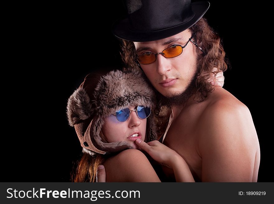 young couple. Posing in a studio. young couple. Posing in a studio