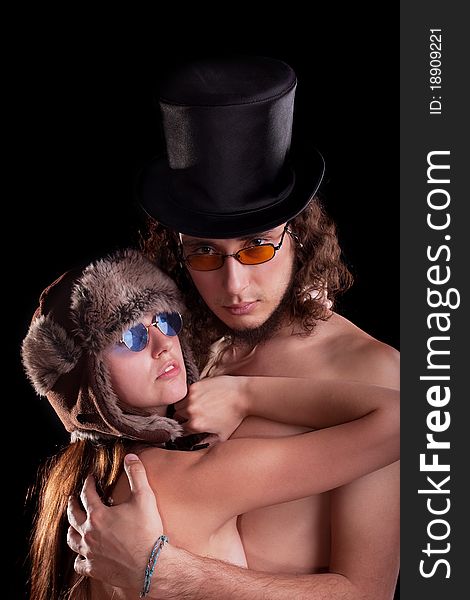 young couple. Posing in a studio. young couple. Posing in a studio