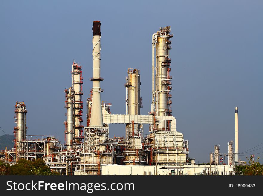 The oil refinery on blue sky background