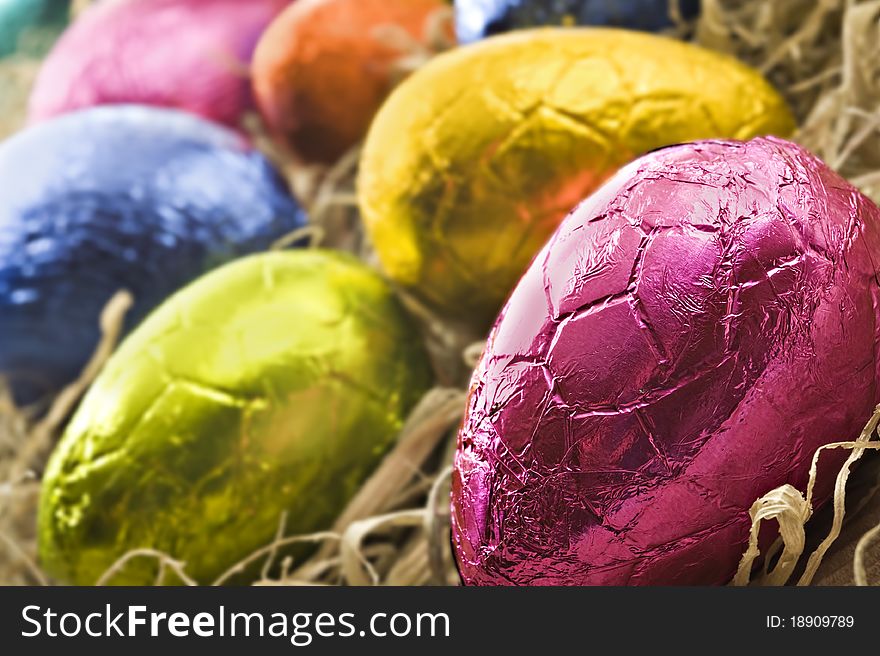 Colorful Easter Eggs In Straw