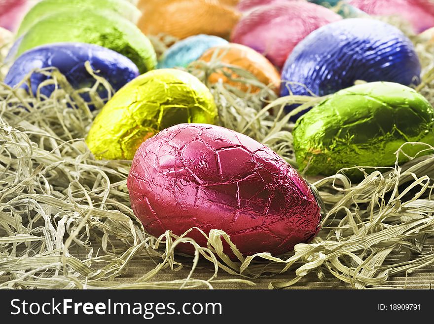 Colorful Easter Eggs In Straw
