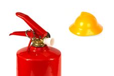 Fire Extinguisher And A Fire Helmet Royalty Free Stock Photo