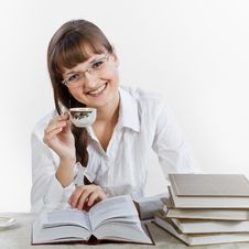 Smiling Girl Reading A Books And Drinking Coffee Stock Photography Smiling Girl Reading A Books And Drinking Coffee Stock Photography