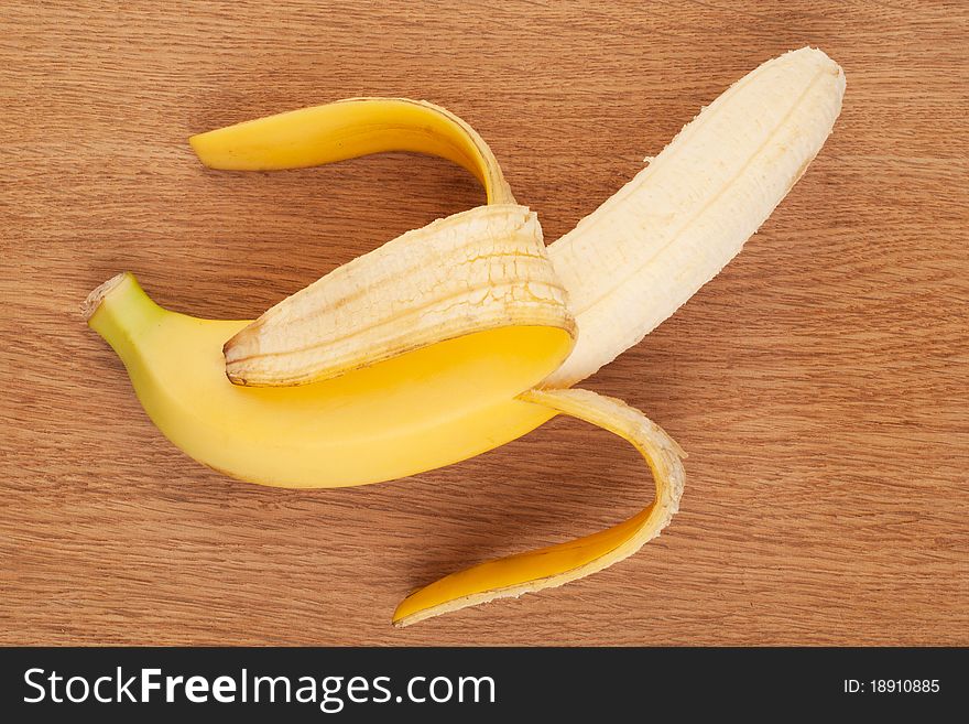 Ripe banana on a wooden background