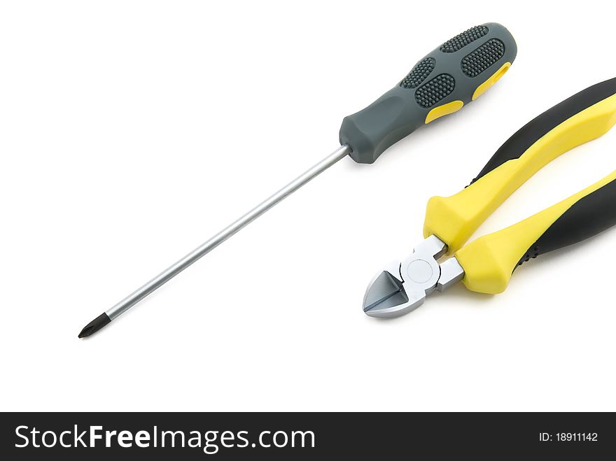 Screwdrivers and cutter isolated on white background