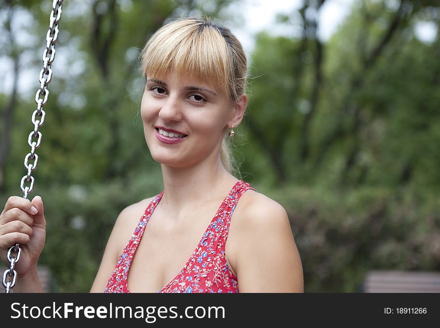 Portrait of a beautiful woman smiling outdoors