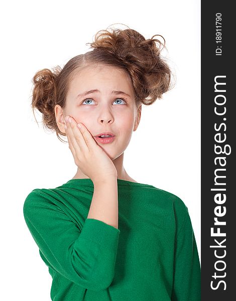 Worried girl with teethahce looking up