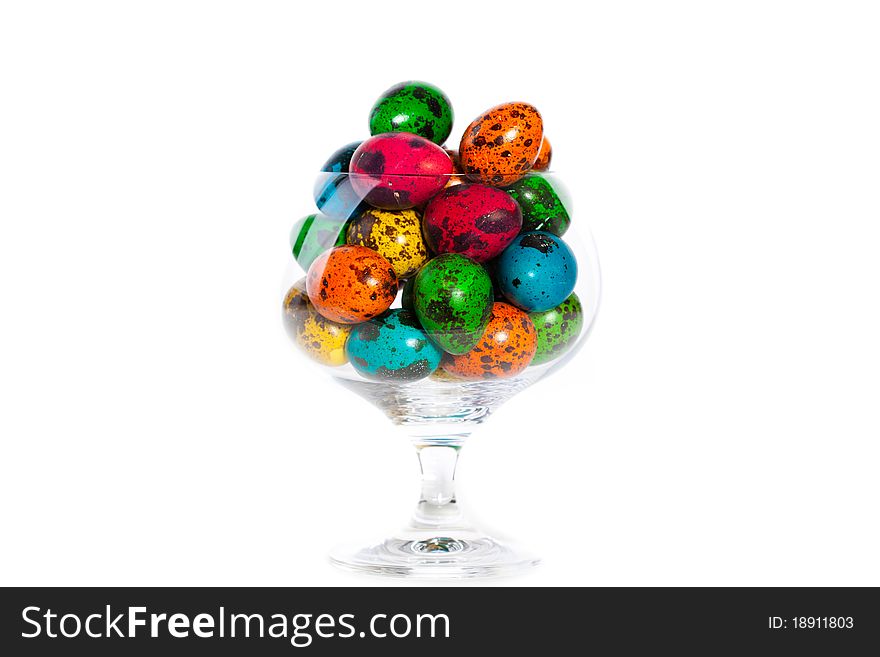 Easter colorful eggs in glass, closeup portrait