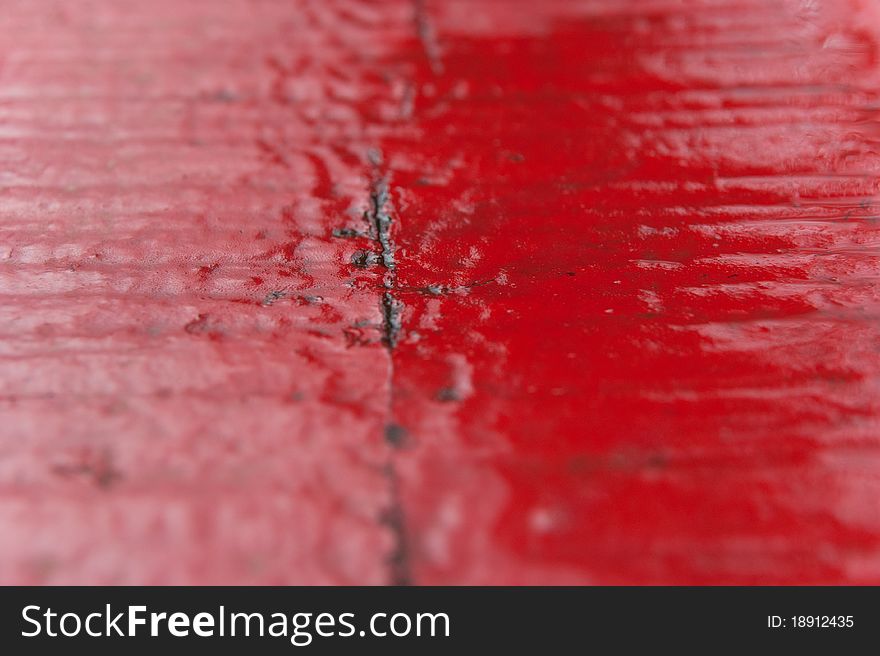 Red dewy painted wood surface background. Red dewy painted wood surface background