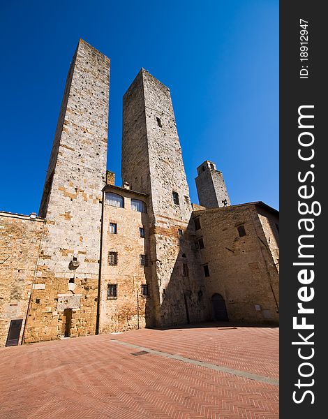 San Gimignano is a medieval village in Tuscany, Italy. San Gimignano is a medieval village in Tuscany, Italy.