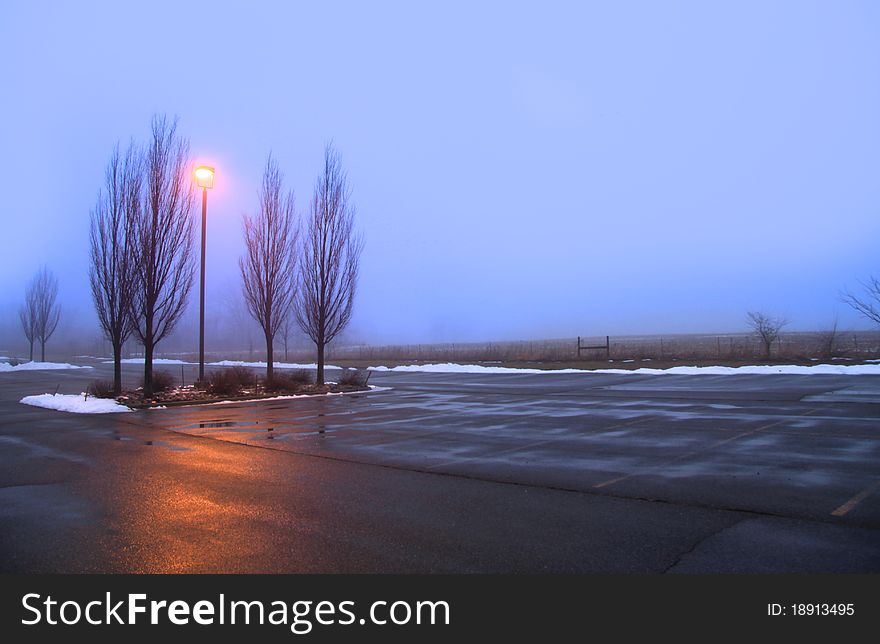 Early morning mist and snow on the street. Early morning mist and snow on the street