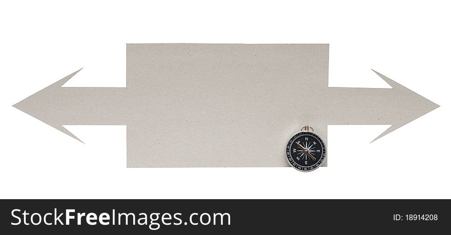 Cardboard navigation arrows with compass on a white background