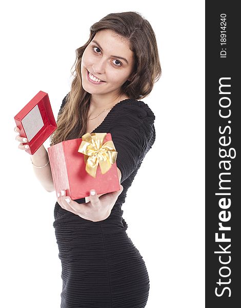 A beautiful woman smiling and holding a gift red box. A beautiful woman smiling and holding a gift red box