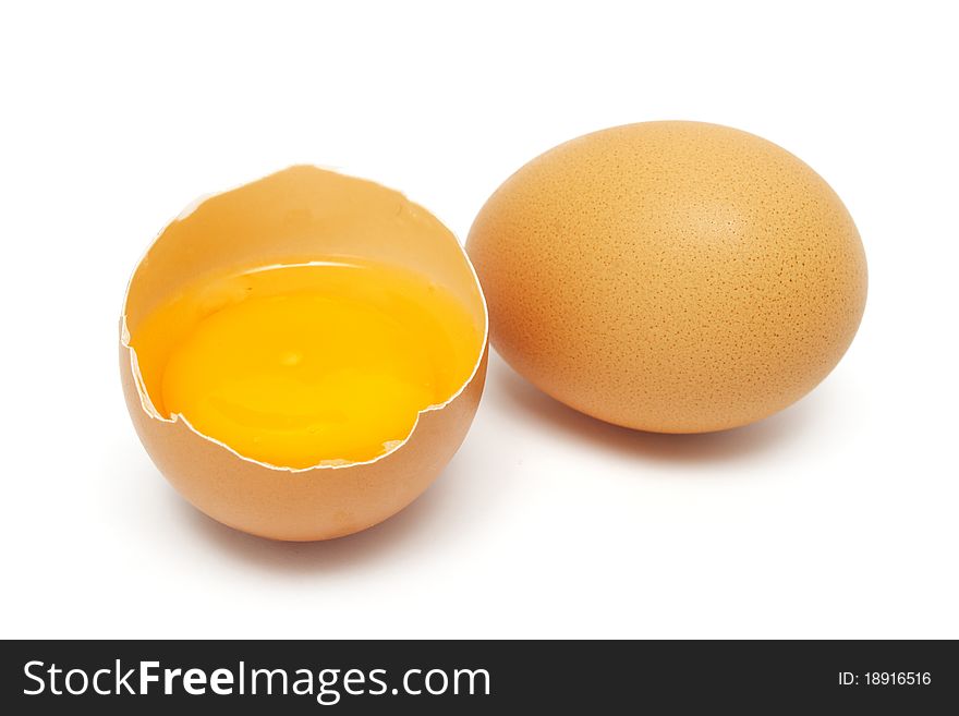 An half egg with yolk and albumin put together with another. An half egg with yolk and albumin put together with another.