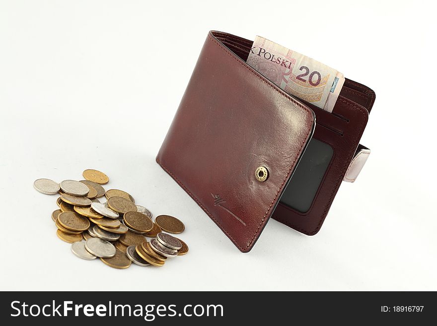 Brown skin wallet and coins isolated on white background. Brown skin wallet and coins isolated on white background.