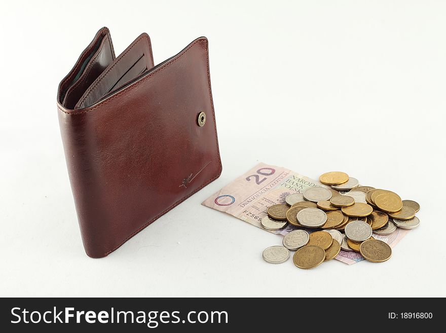 Brown skin wallet and coins isolated on white background. Brown skin wallet and coins isolated on white background.