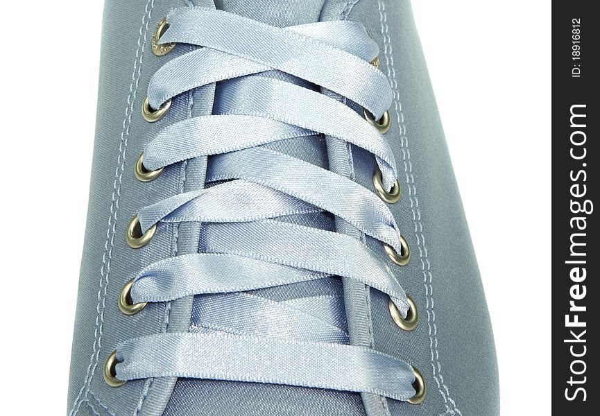 Blue ribbon shoe lacing on white background. Blue ribbon shoe lacing on white background