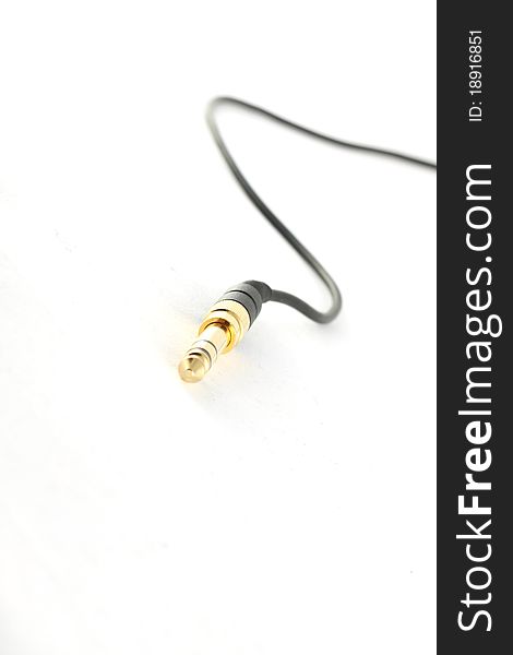 Tip of Hi Fidelity 6.3mm Audio Jack, with golden connector isolated on white background. Tip of Hi Fidelity 6.3mm Audio Jack, with golden connector isolated on white background.