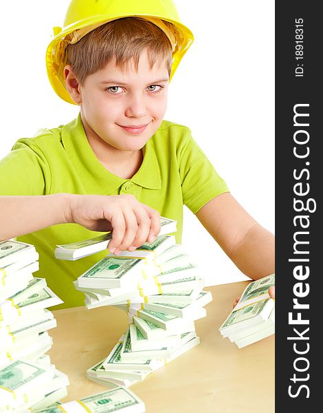 Young businessman with dollars on the table