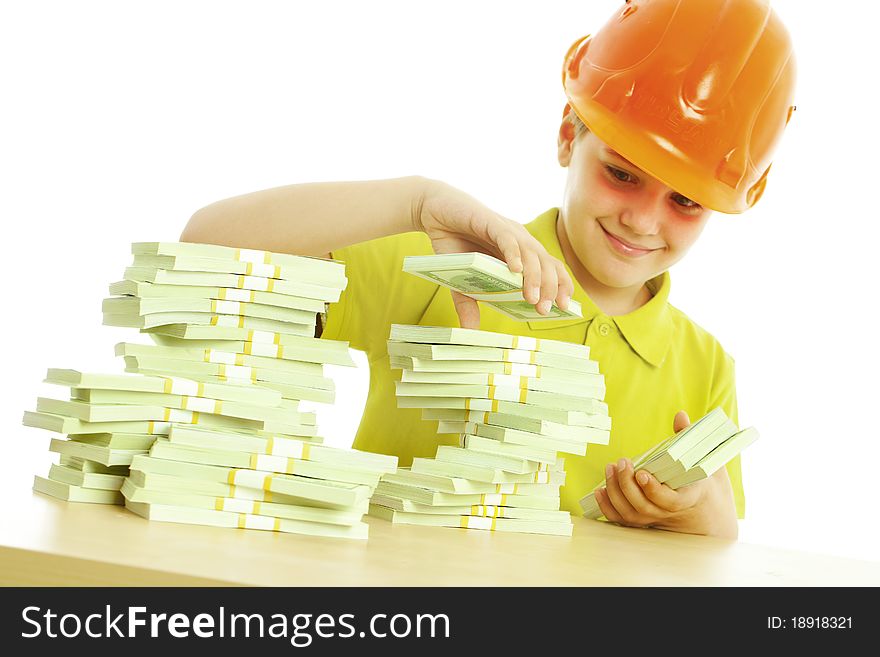 Little businessman playing with money