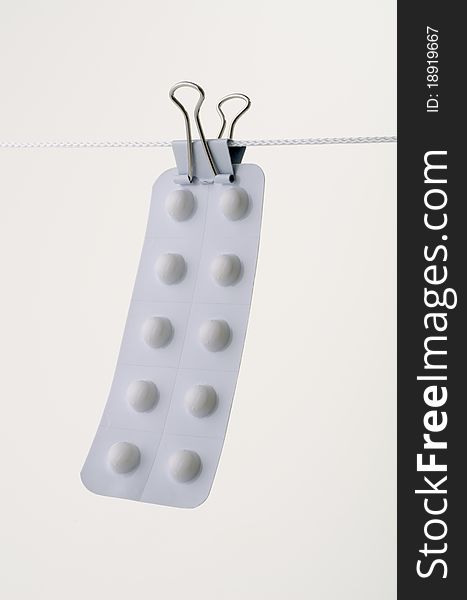 Blister pack of pills hung