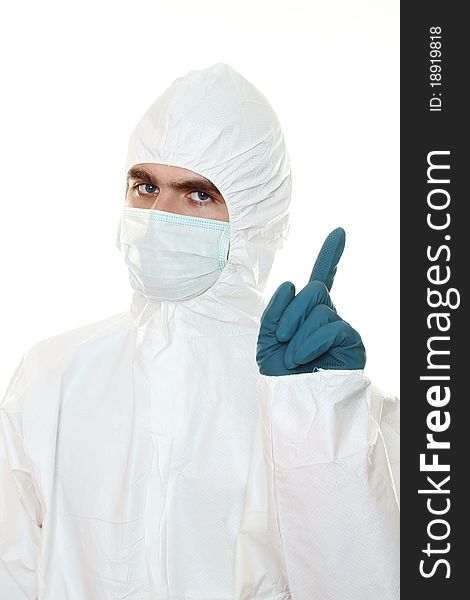 Man in protective suit, a mask and a respirator. Holds a sign with a skull. Isolated on white