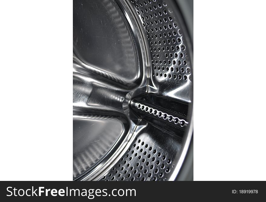 A close-up of the washing machine drum. A close-up of the washing machine drum