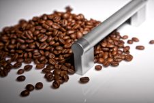 The Door Handle And Coffee Grains Stock Photo