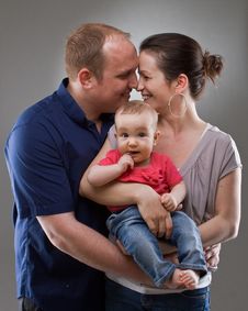 Family With Baby Girl Stock Photo
