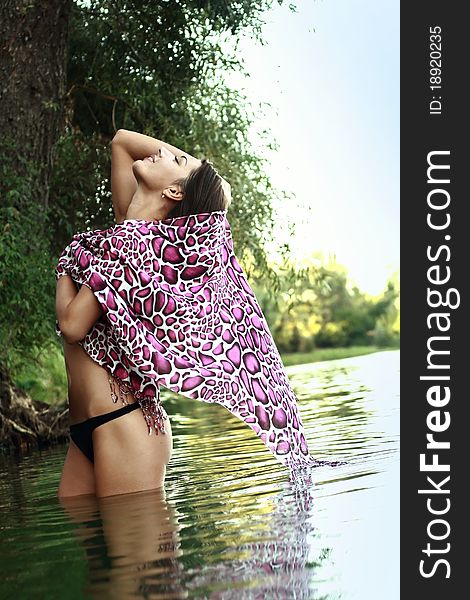 Beautiful Girl Bathing In A Lake