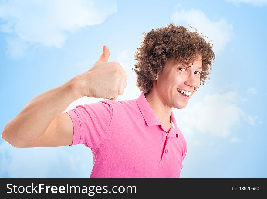 Happy curly man on yellow background