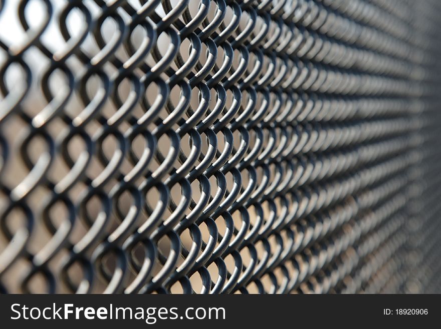 Abstract of a section of fence showing leading lines and shallow depth of field. Abstract of a section of fence showing leading lines and shallow depth of field