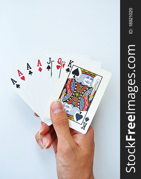 Hand is holding the card for playing