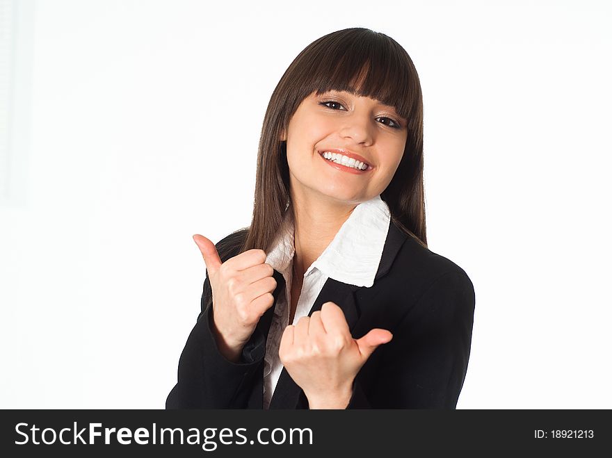 Nice girl in a business suit standing on white background