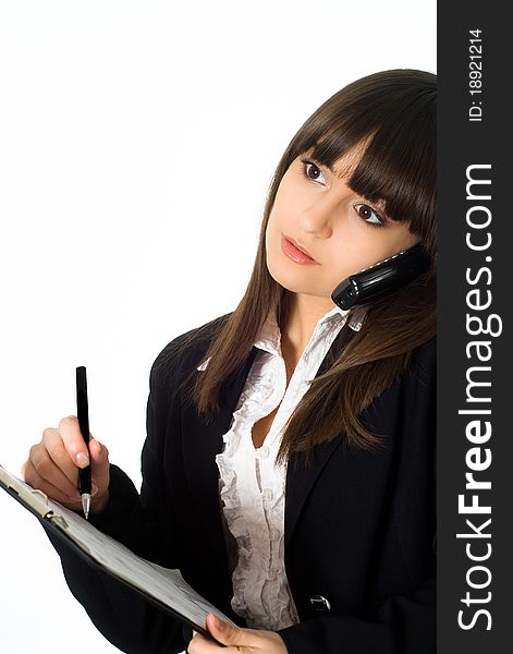 Nice girl in a business suit standing on white background