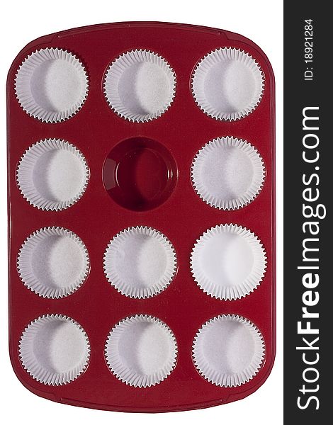 Silicone bakeware red with paper cups for baking.