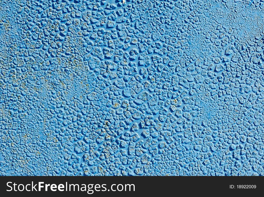 An image of a blue background of weathered surface