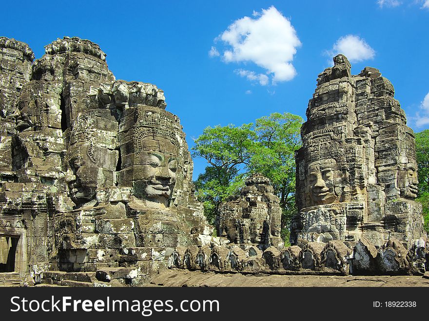 Stone head on towers of Bayon temple in Angkor Thom, Cambodia. Stone head on towers of Bayon temple in Angkor Thom, Cambodia