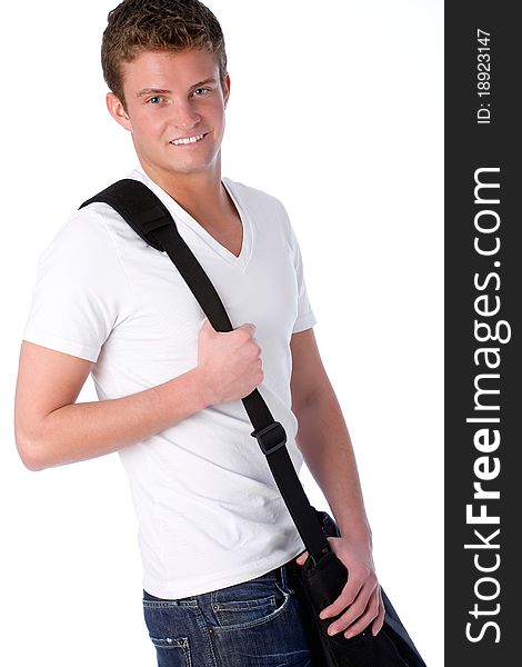 Young man poses with laptop bag over his shoulder. Young man poses with laptop bag over his shoulder.