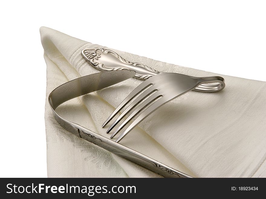 Fork and knife, isolated 
on a white background. Fork and knife, isolated 
on a white background.