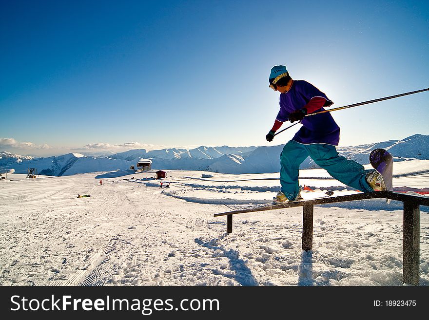 Freerider jumping in the mountains