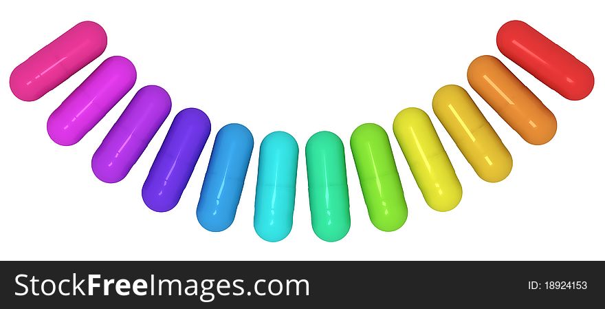 Many-colored pills on white background