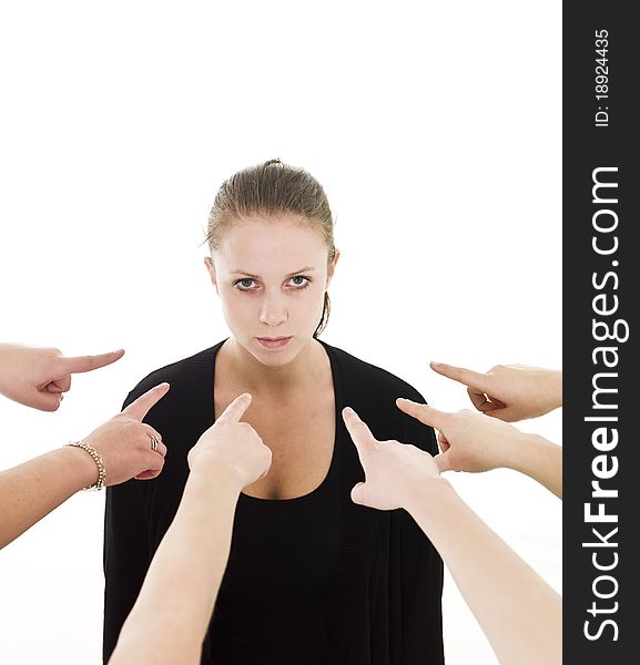 Group of Hands pointing at a woman on white background