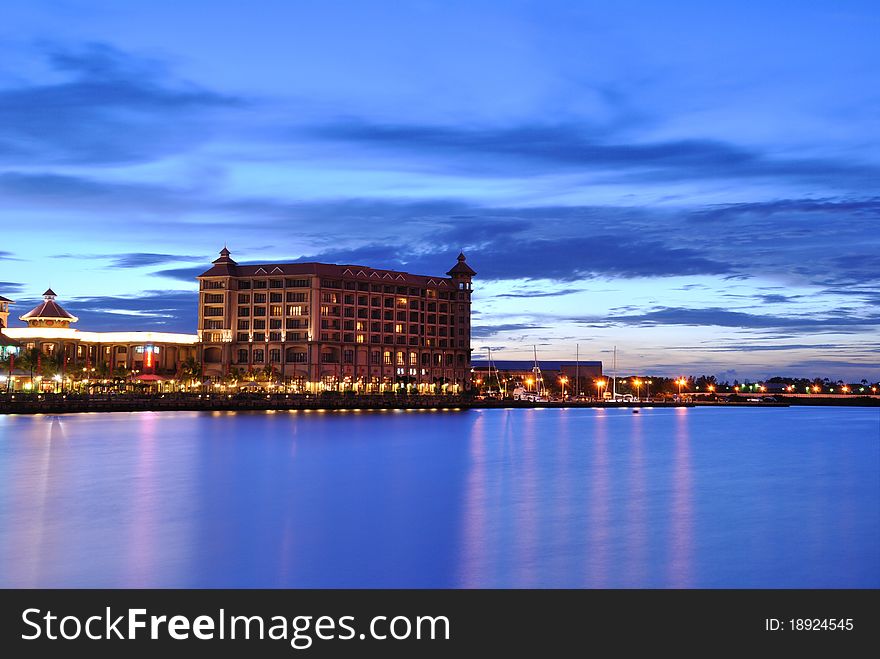 A building near the sea with blue sky and sea