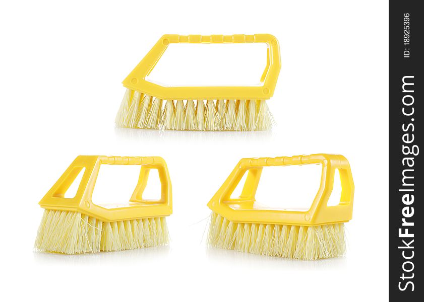 Three pieces of yellow brush isolated on white background